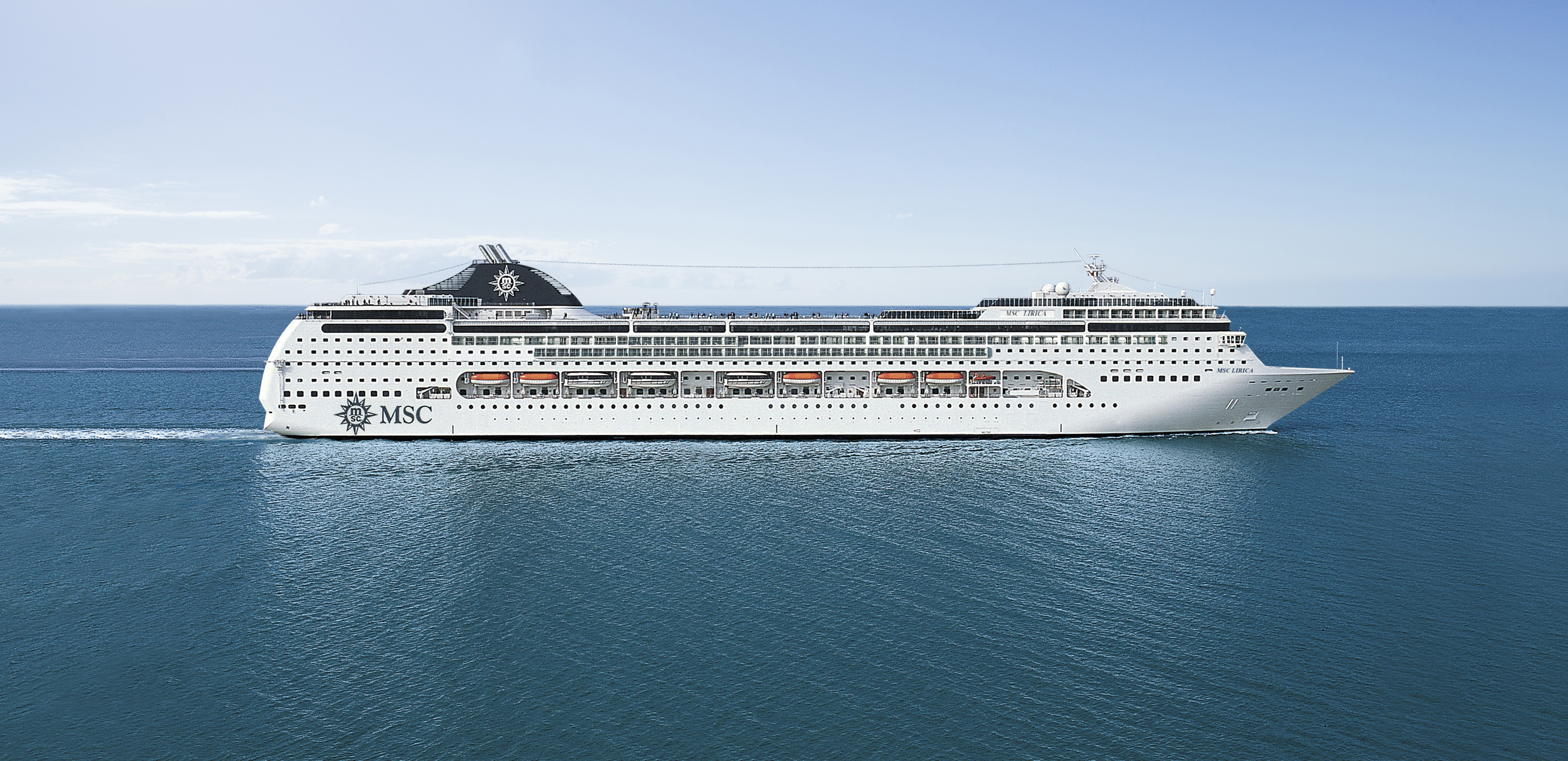MSC Lirica sailing under clear midday sky