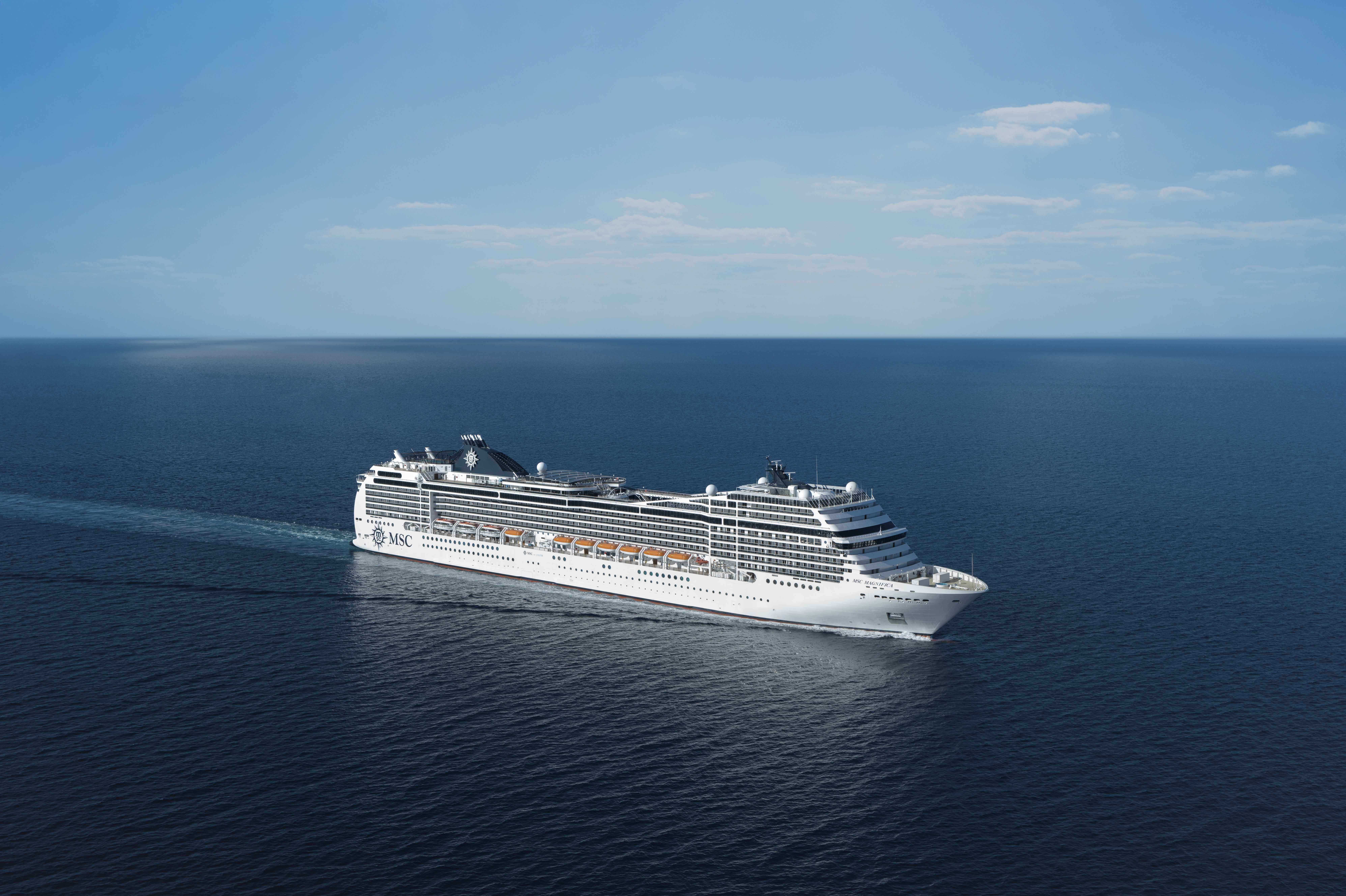 MSC Magnifica sunny aerial exterior underway on open ocean