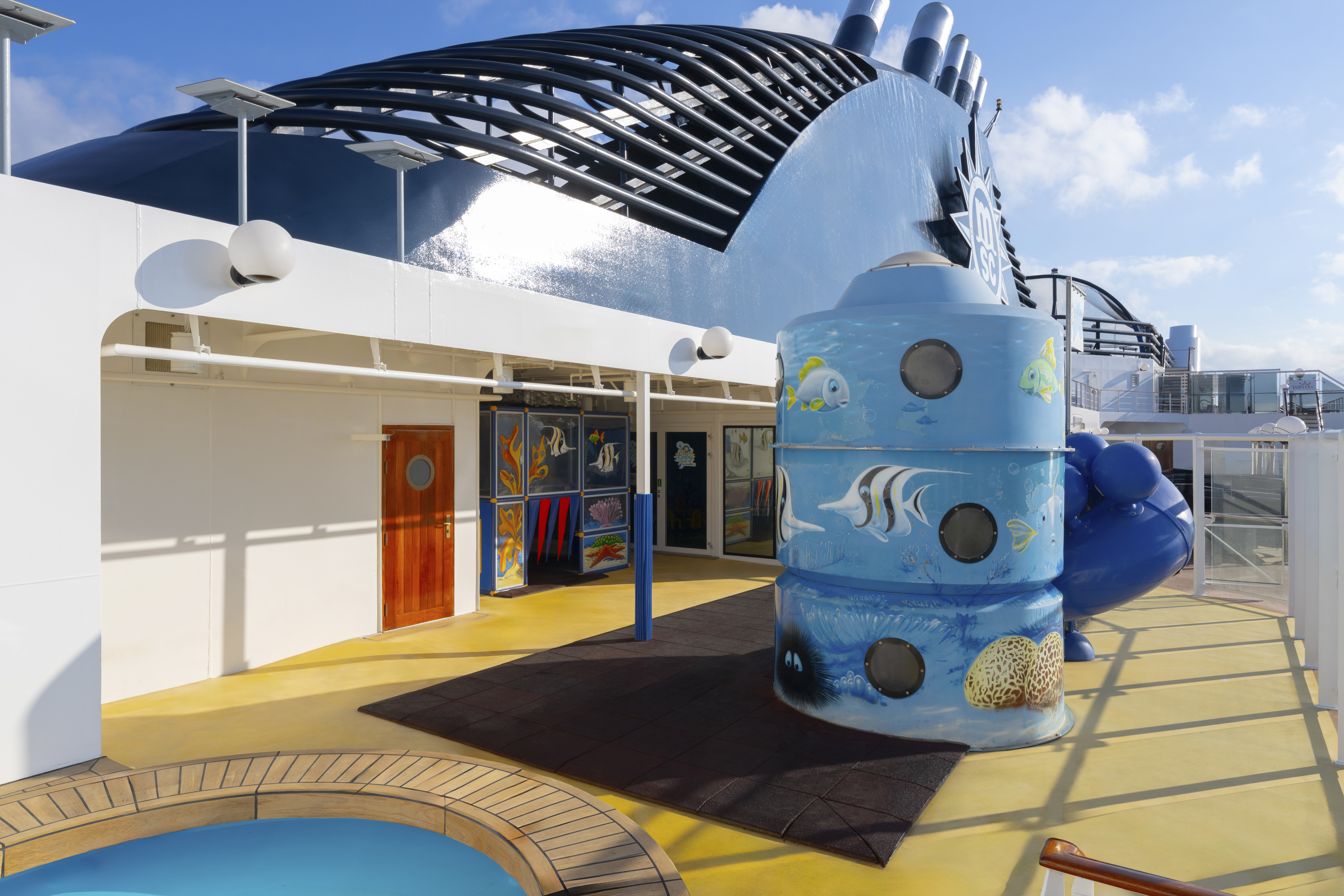 MSC Magnifica children’s outdoor pool and play structures in sunshine