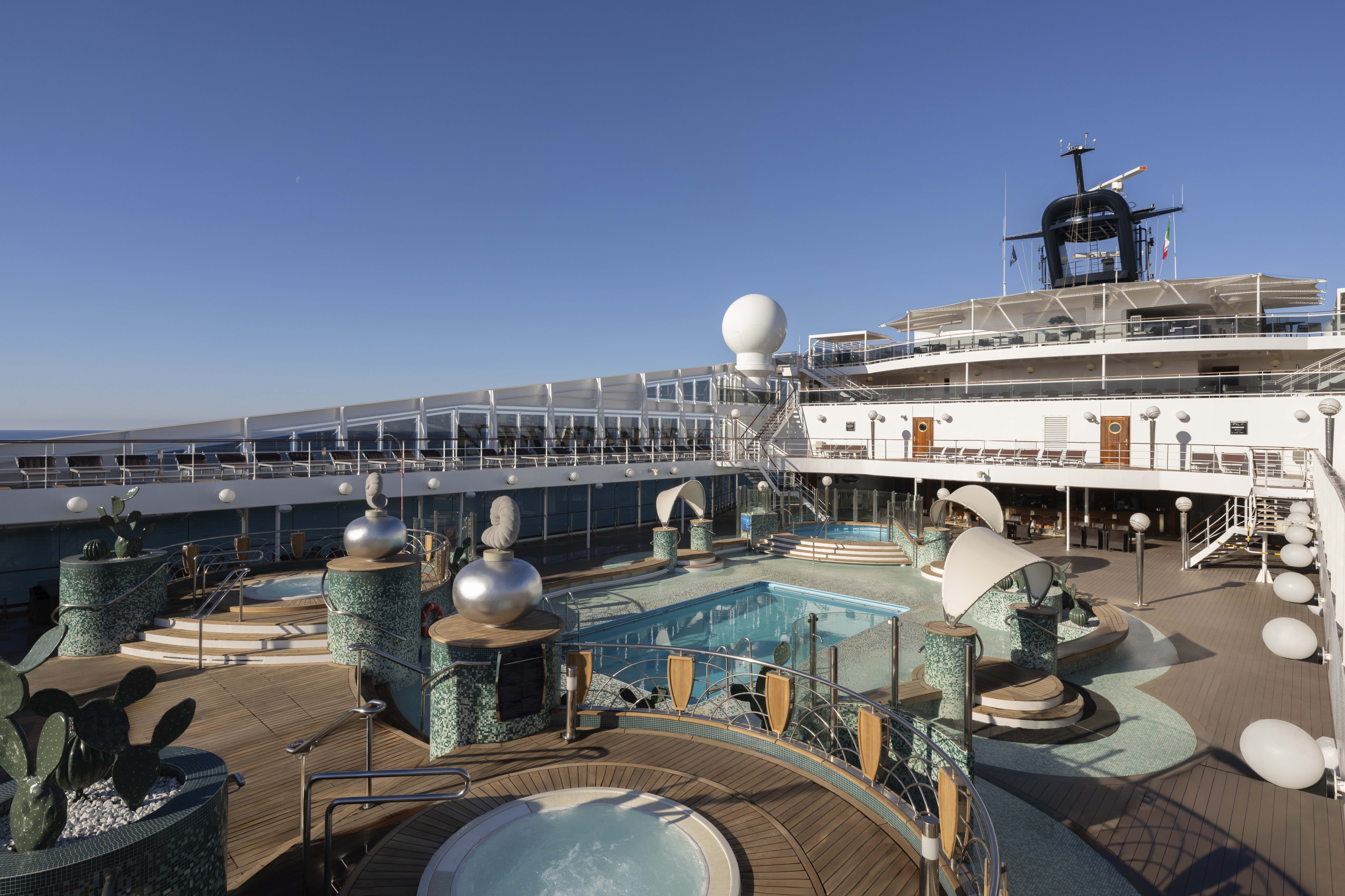 MSC Magnifica Le Grand Bleu pool and whirlpools under bright sun