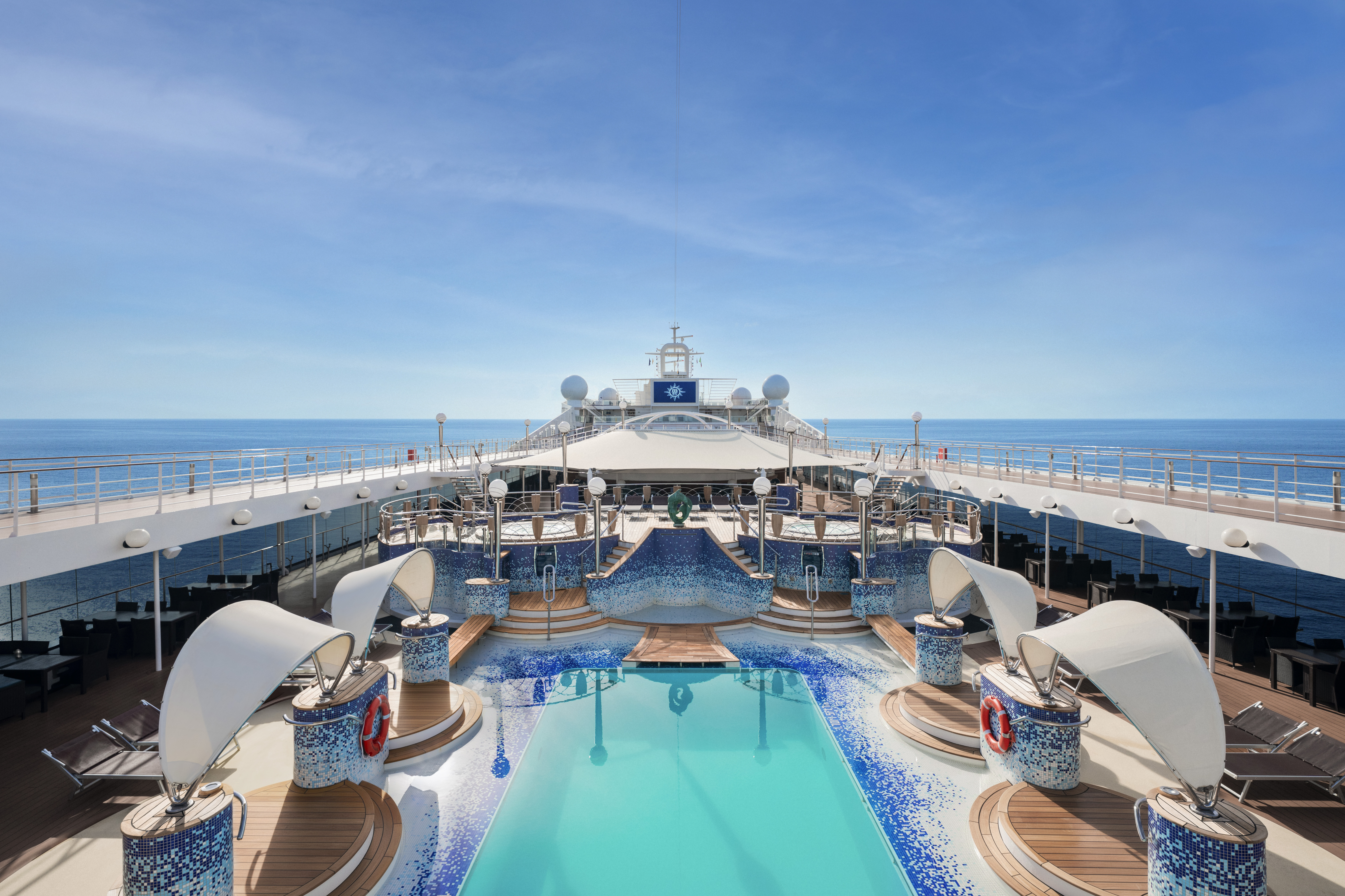 MSC Musica La Spiaggia pool and shell sunshades in bright sun
