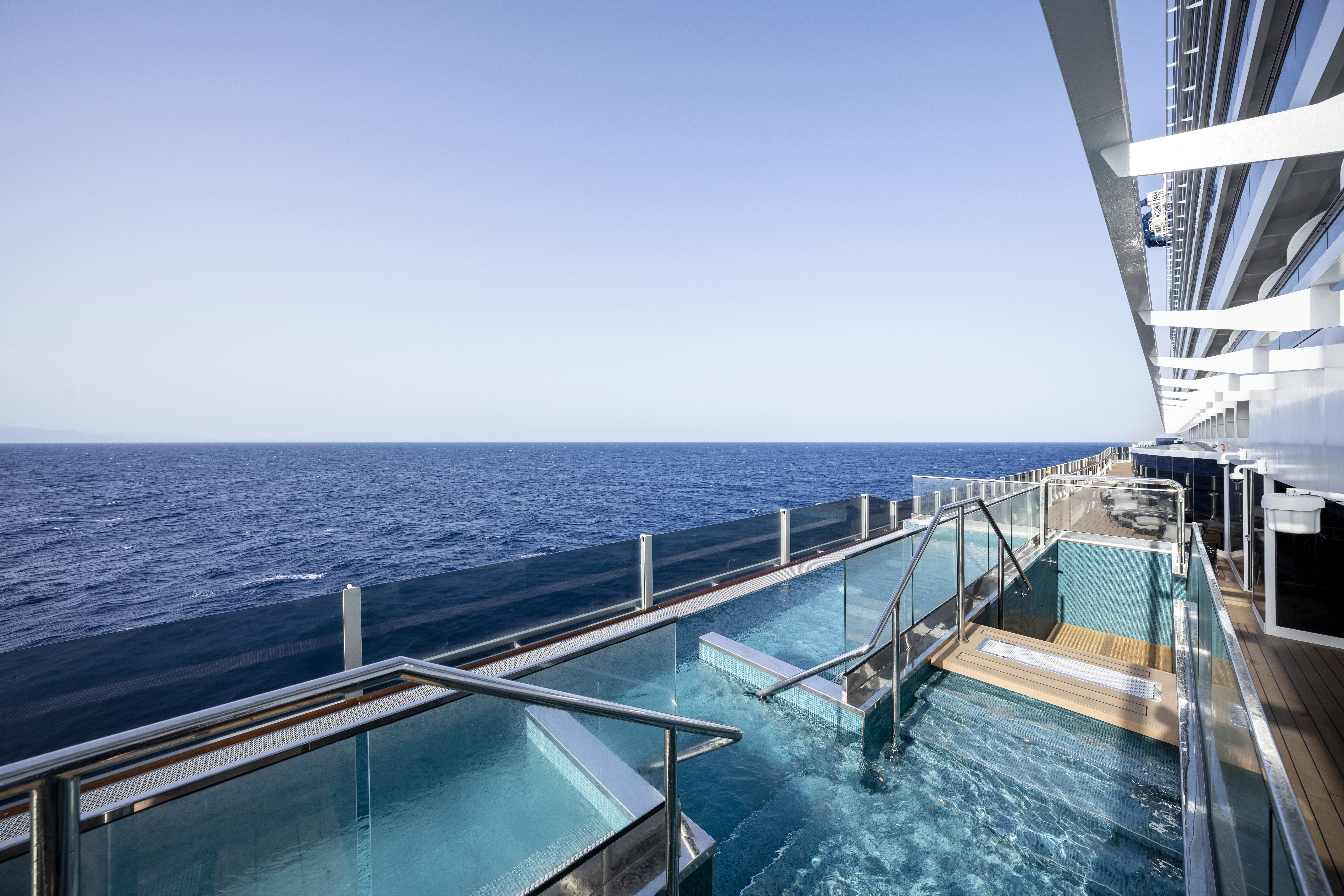 MSC Seashore glass-edge infinity whirlpools overlooking the ocean