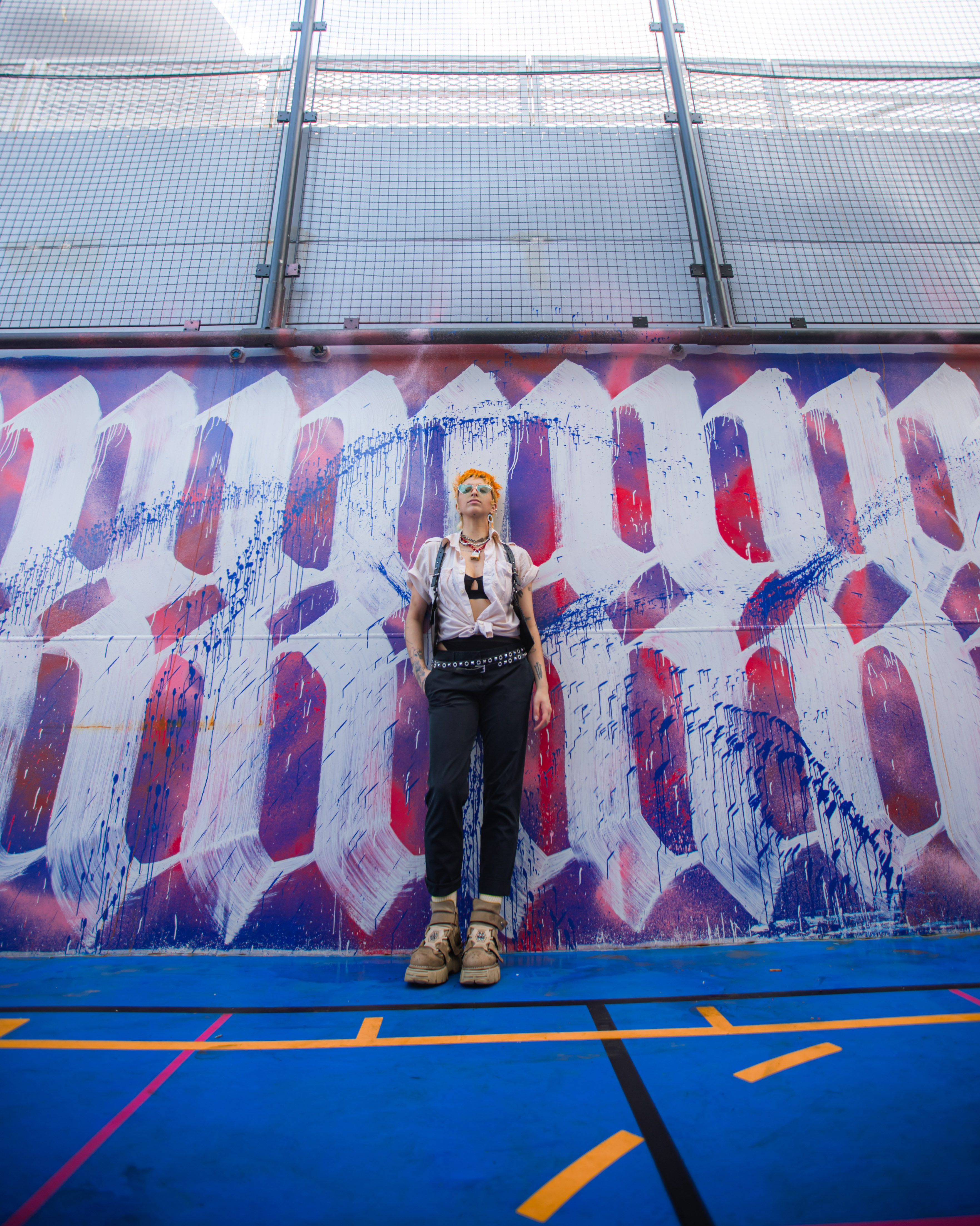 Training Camp basketball court mural in bright light.