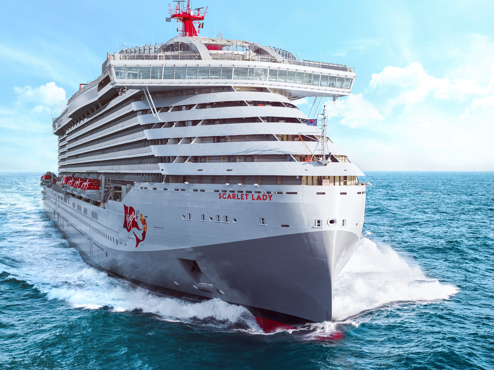 Scarlet Lady full exterior sailing, sunny blue water