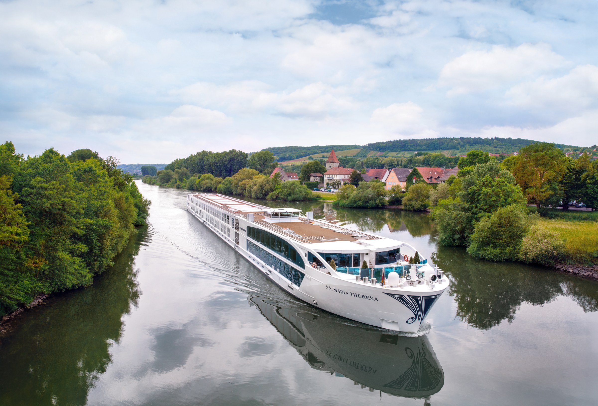 S.S. Maria Theresa – sailing a tree-lined river
